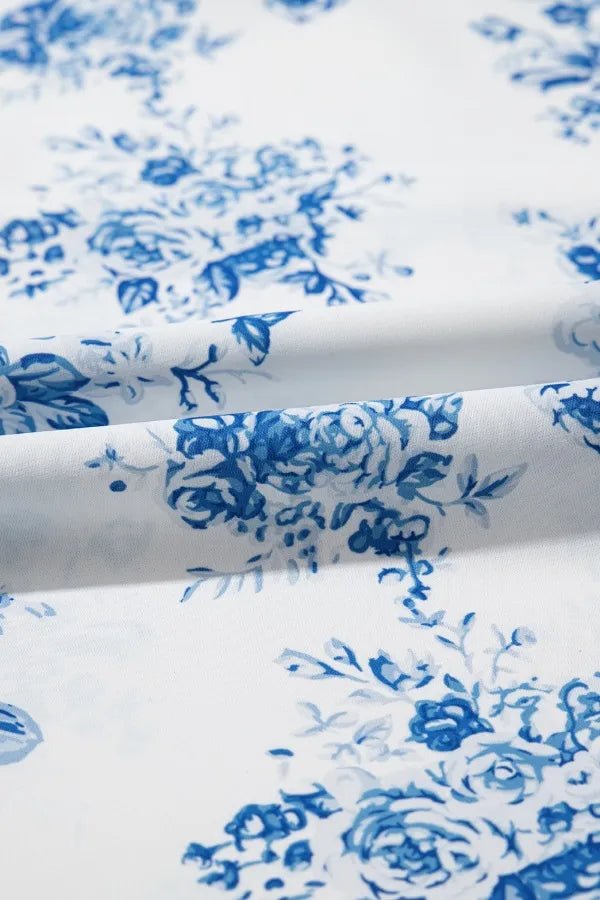 Crowned Energy CO. Light Blue / S Trendsi Dresses/Floral Dresses Split Asymmetrical Ruffled Printed Skirt