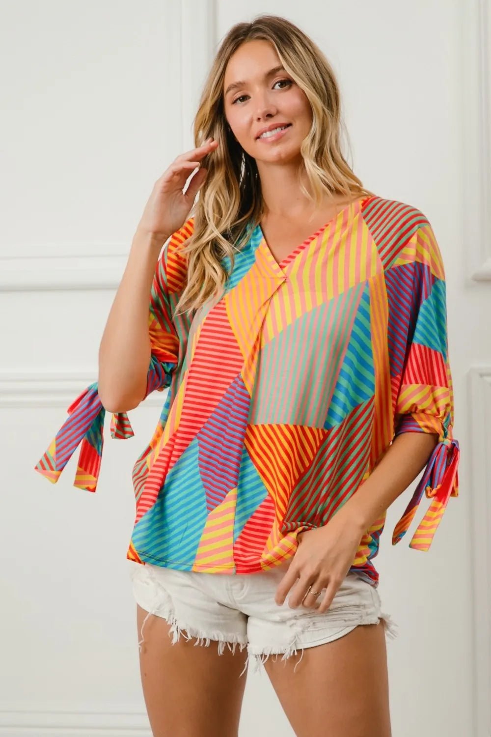 Crowned Energy CO. RED/YELLOW/GRN / S Trendsi Tops/Blouses & Shirts BiBi Multi Stripe Block Printed Jersey Blouse with Tied Sleeves