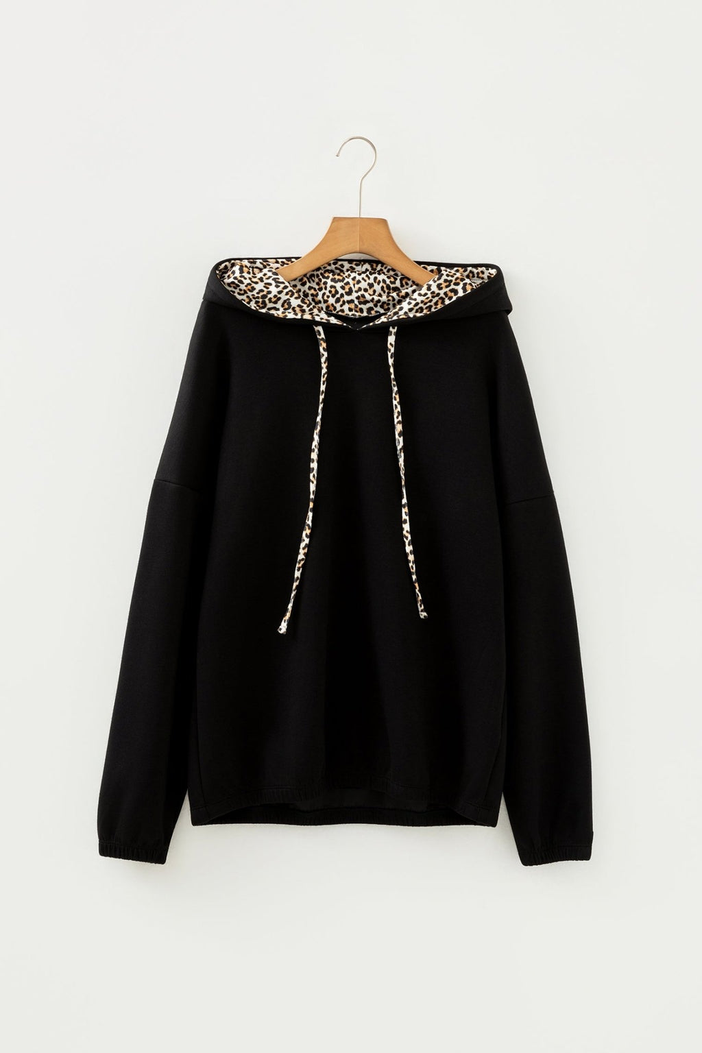 Black Leopard Contrast Drawstring Hood Drop Shoulder Loose Top - Crowned Energy CO.
