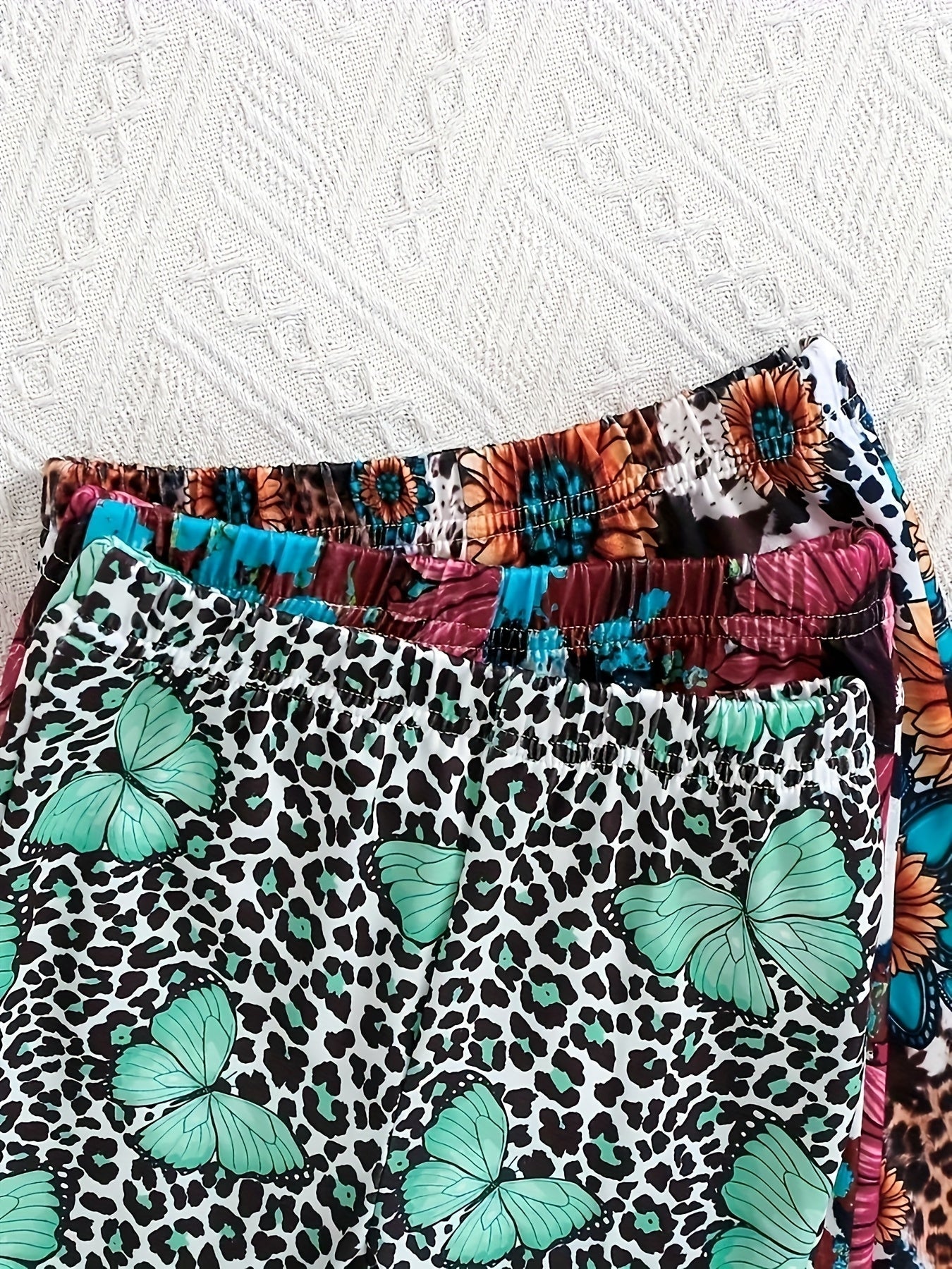 Floral Leopard Print Butterfly 'LOVE' Letter Graphic Short - Sleeve T-Shirt and Flared Long Pants - Crowned Energy CO.