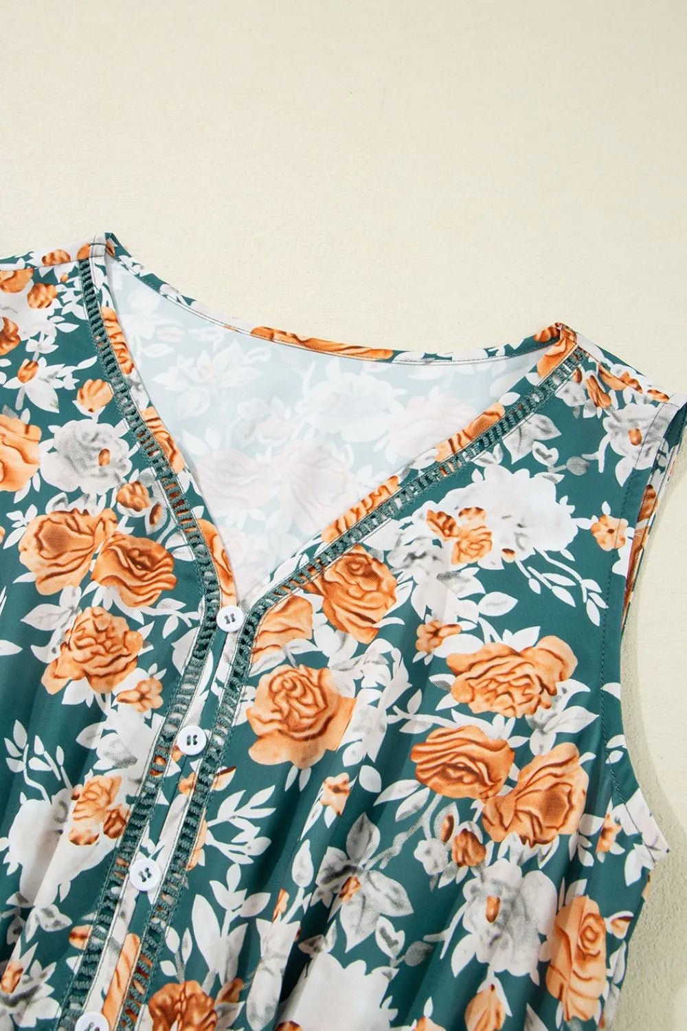 Crowned Energy CO. Floral / S Trendsi Dresses Floral Print Trimmed V Neck Tie Waist Sleeveless Dress