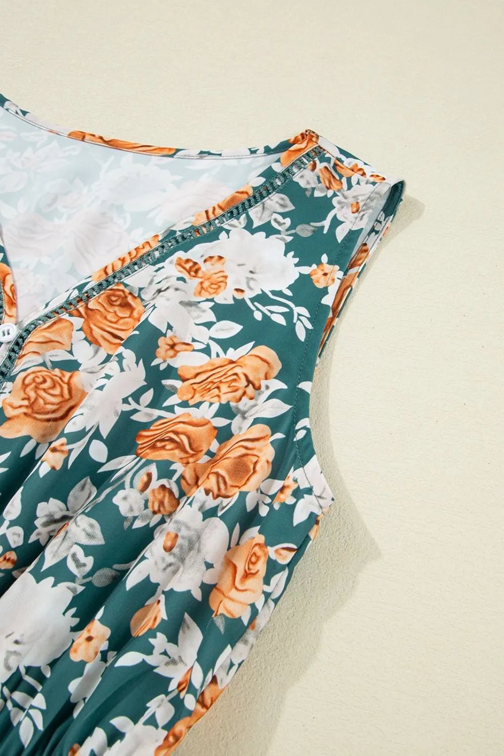 Crowned Energy CO. Floral / S Trendsi Dresses Floral Print Trimmed V Neck Tie Waist Sleeveless Dress