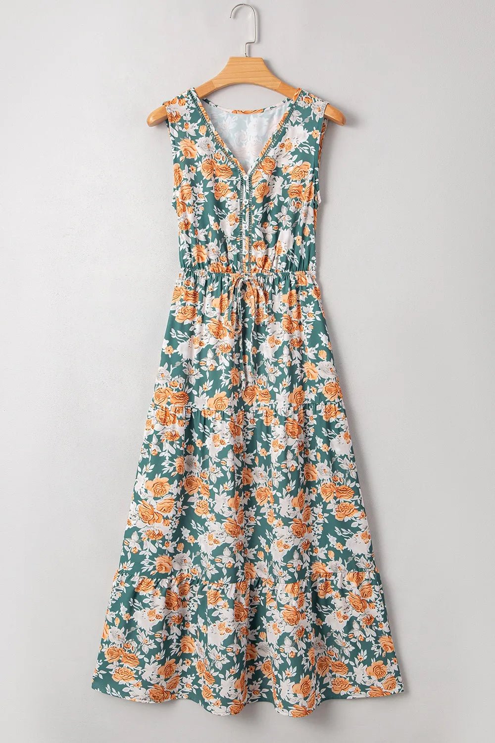 Crowned Energy CO. Floral / S Trendsi Dresses Floral Print Trimmed V Neck Tie Waist Sleeveless Dress