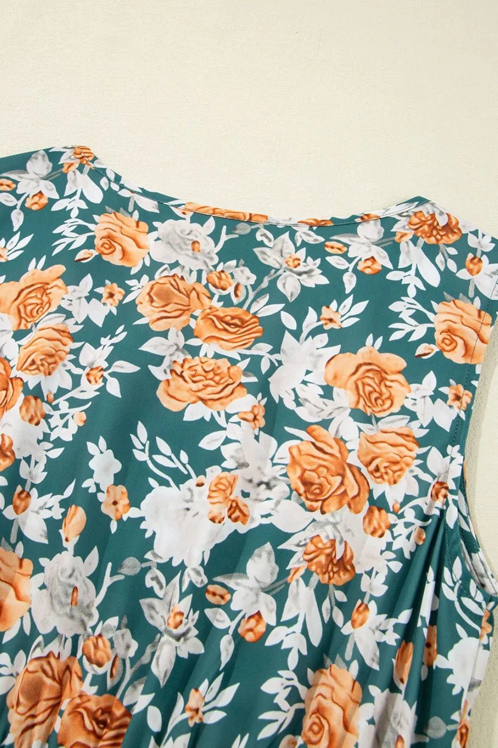 Crowned Energy CO. Floral / S Trendsi Dresses Floral Print Trimmed V Neck Tie Waist Sleeveless Dress