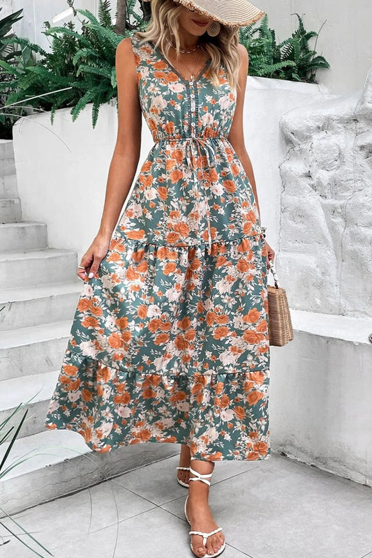 Crowned Energy CO. Floral / S Trendsi Dresses Floral Print Trimmed V Neck Tie Waist Sleeveless Dress