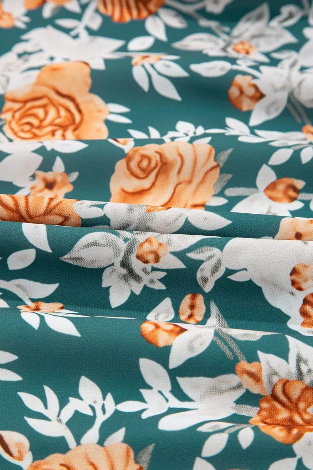 Crowned Energy CO. Floral / S Trendsi Dresses Floral Print Trimmed V Neck Tie Waist Sleeveless Dress