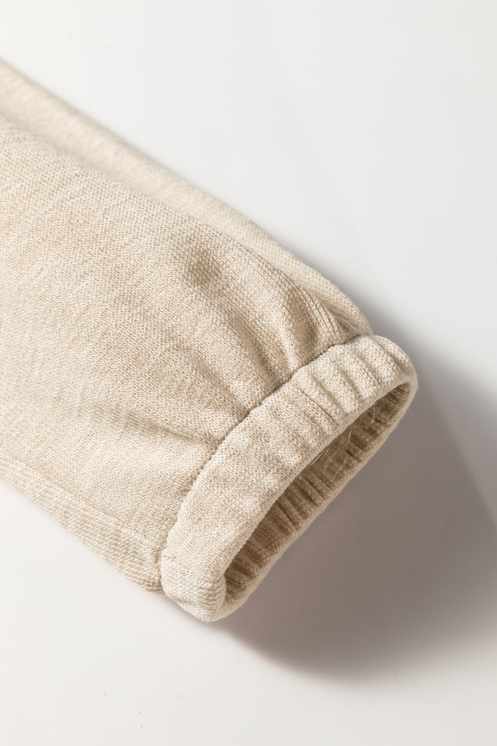 Jet Stream Textured Pleated Drop Shoulder Long Sleeve Knit Top - Crowned Energy CO.