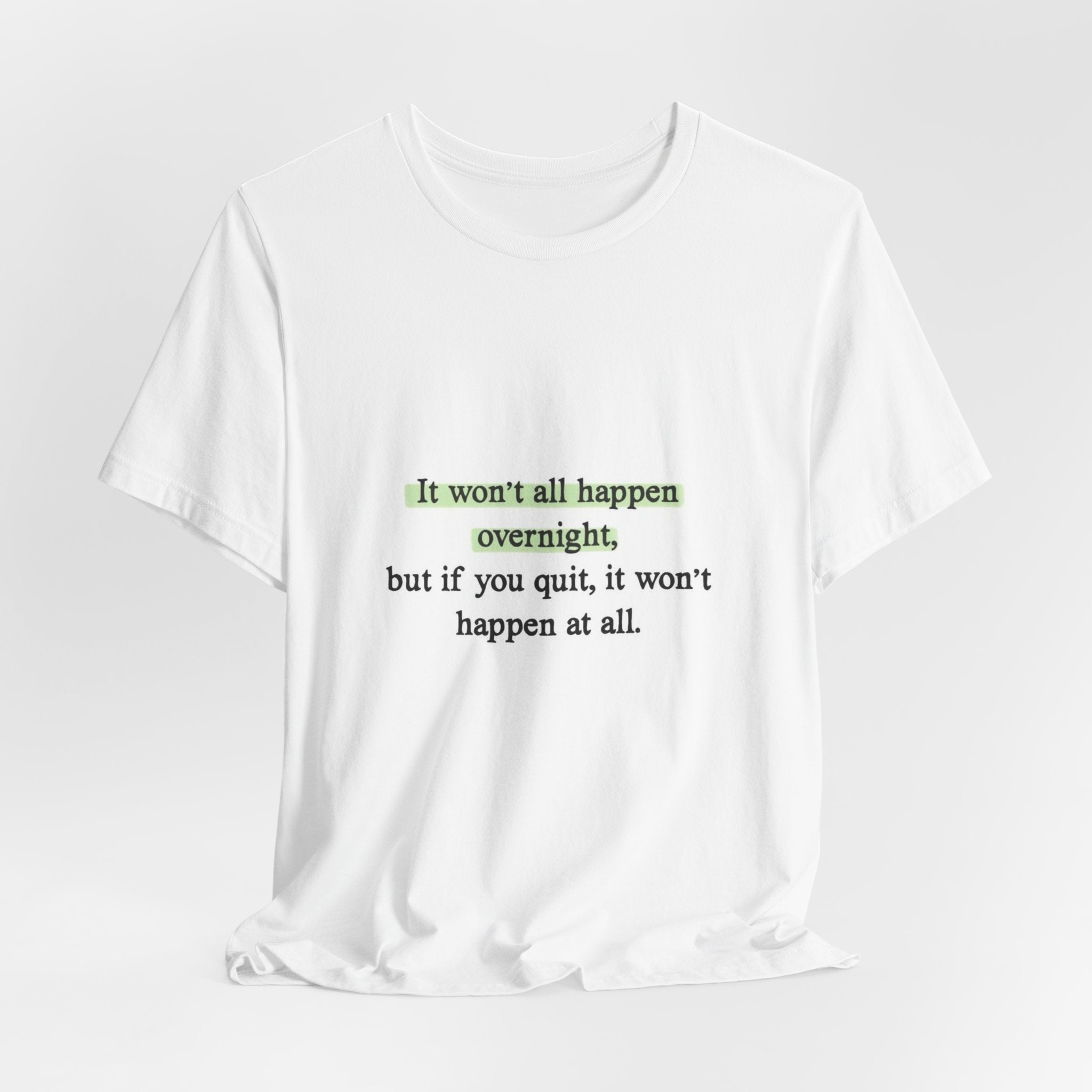 Motivational Quote Tee — "It won't all happen overnight, but if you quit, it won't happen at all." - Crowned Energy CO.