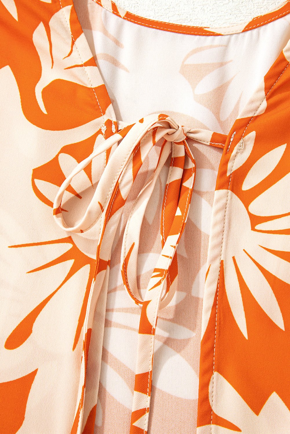 Orange Floral Print Knotted Open Back Long Sleeve Blouse - Crowned Energy CO.