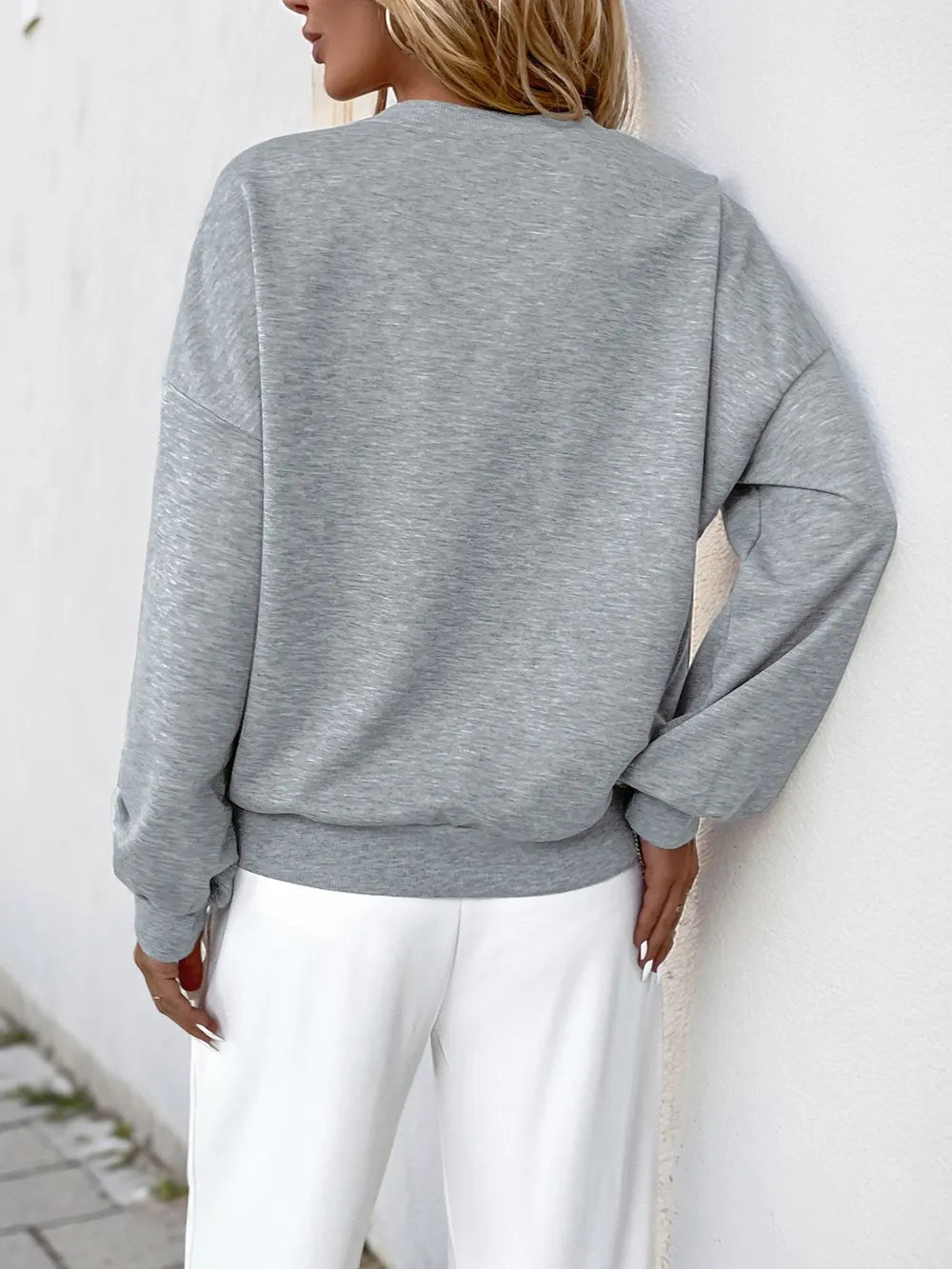 Perfee Cutout Pearl Round Neck Long Sleeve Sweatshirt - Crowned Energy CO.
