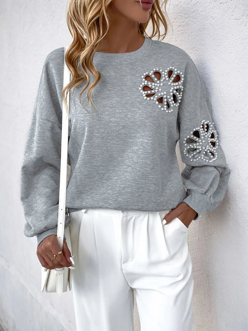 Perfee Cutout Pearl Round Neck Long Sleeve Sweatshirt - Crowned Energy CO.
