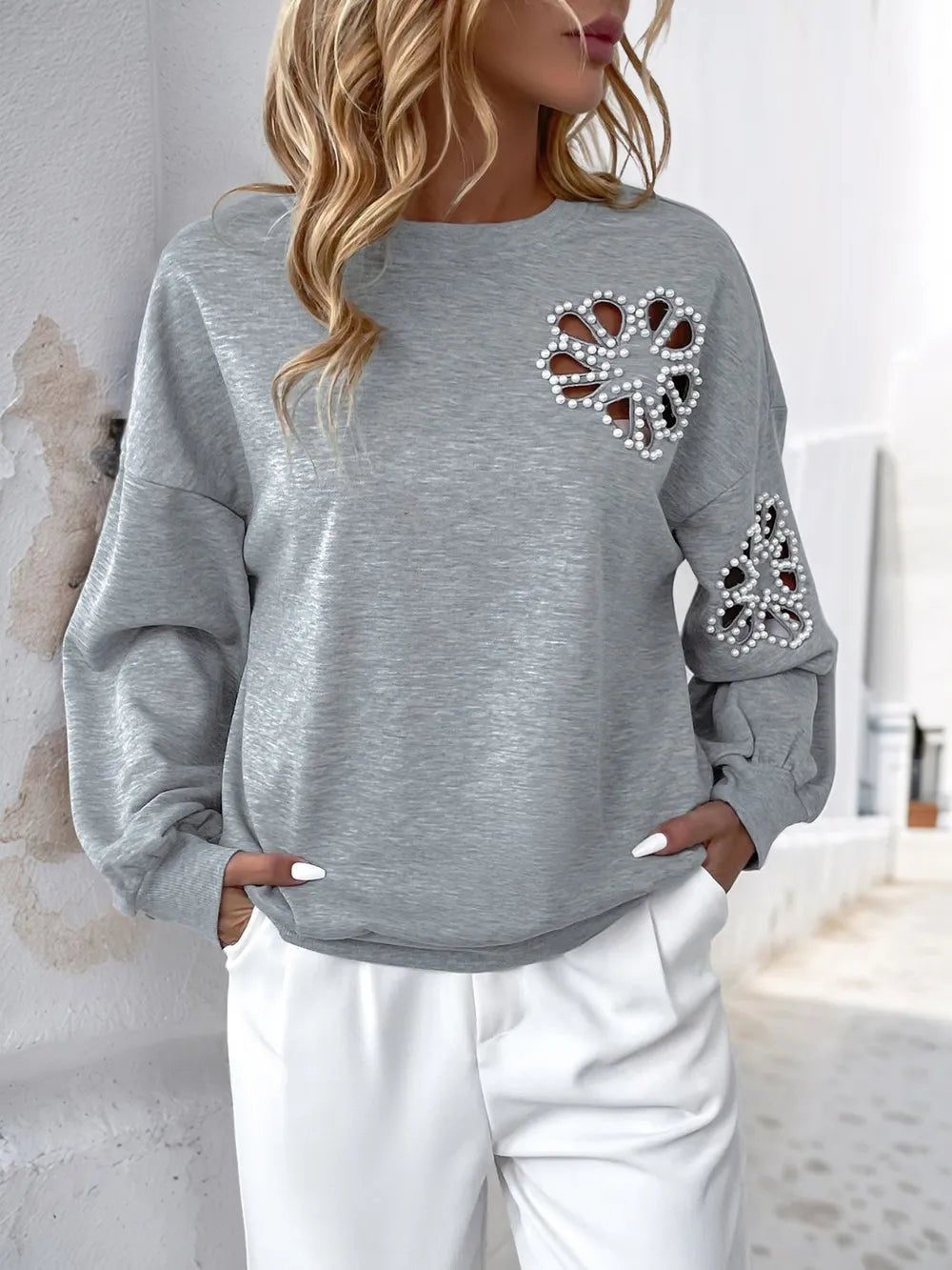 Perfee Cutout Pearl Round Neck Long Sleeve Sweatshirt - Crowned Energy CO.