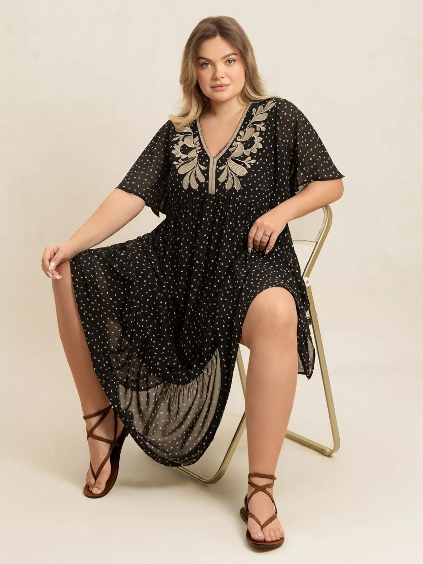 Crowned Energy CO. Black / 0XL Trendsi Dresses Plus Size Printed V-Neck Flutter Sleeve Maxi Dress