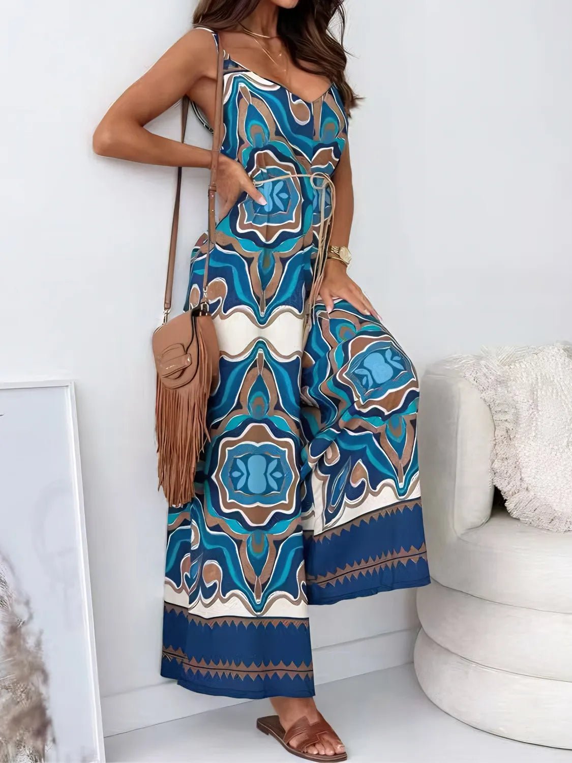 Crowned Energy CO. Peacock Blue / S Trendsi Jumpsuit Printed V-Neck Wide Leg Jumpsuit