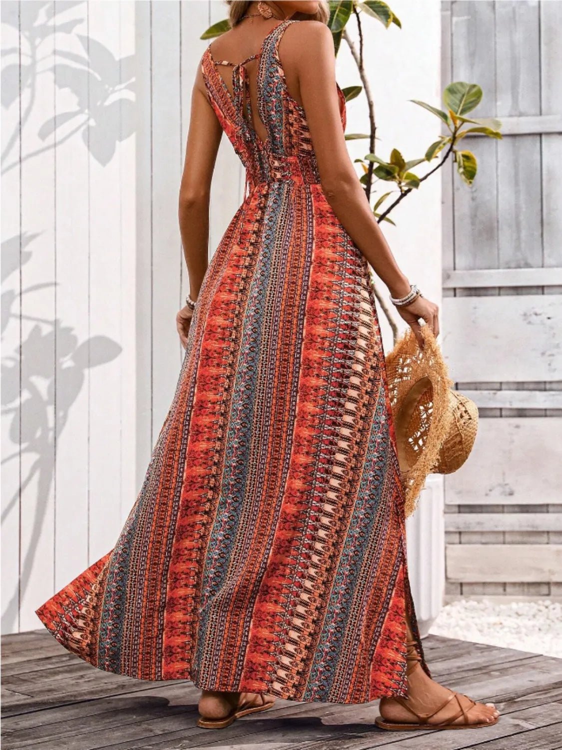 Crowned Energy CO. Orange-Red / S Trendsi Dresses/Maxi Dresses Tied Back Printed Sleeveless Maxi Slit Dress