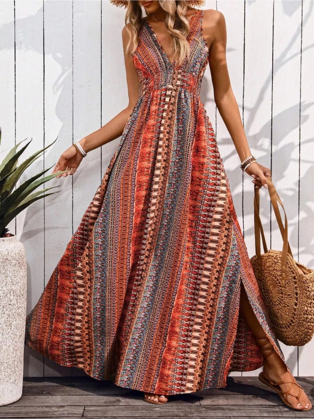 Crowned Energy CO. Orange-Red / S Trendsi Dresses/Maxi Dresses Tied Back Printed Sleeveless Maxi Slit Dress
