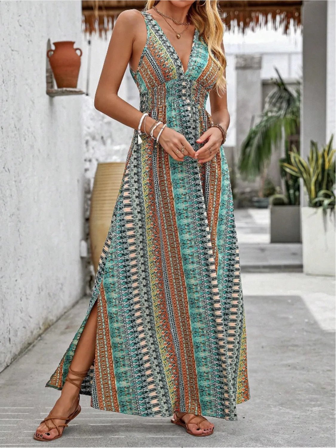 Crowned Energy CO. Orange-Red / S Trendsi Dresses/Maxi Dresses Tied Back Printed Sleeveless Maxi Slit Dress