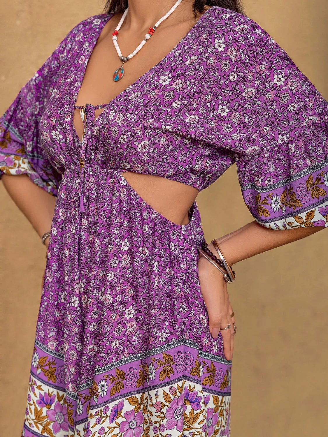 Crowned Energy CO. Purple / S Trendsi Jumpsuit Tied Front Cutout Printed Romper
