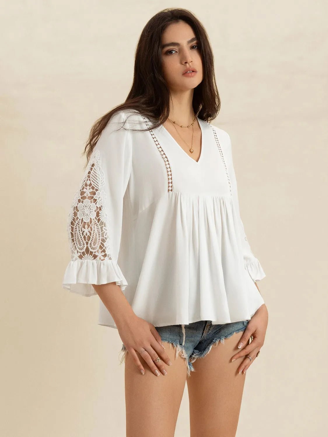 Crowned Energy CO. White / S Trendsi Tops/Blouses & Shirts V-Neck Lace Flounce Sleeve Top